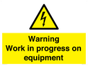 warning-work-in-progress-on-equipmentwith-electrical-hazard-symbol~